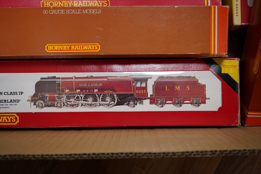 Seven boxed 00 gauge locomotives by Hornby Railways, GMR, Lima, etc. including; an LMS Coronation Class (R.066), two SR Schools Class (R.57 and R.817), a GWR Prairie Tank (54150-1), an LMS Royal Scot Class (54120-0), an